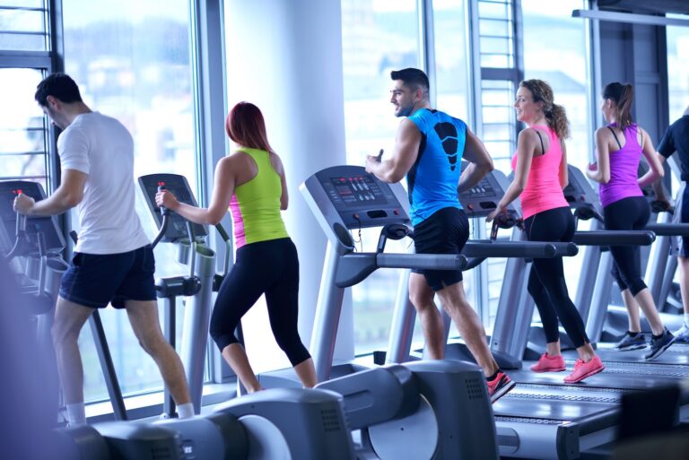 gym members on treadmill